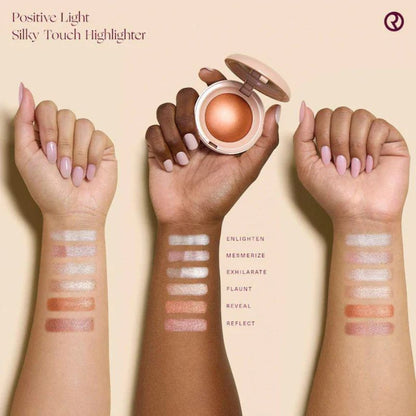 Silky Touch Highlighter with swatches on hands against a beige background